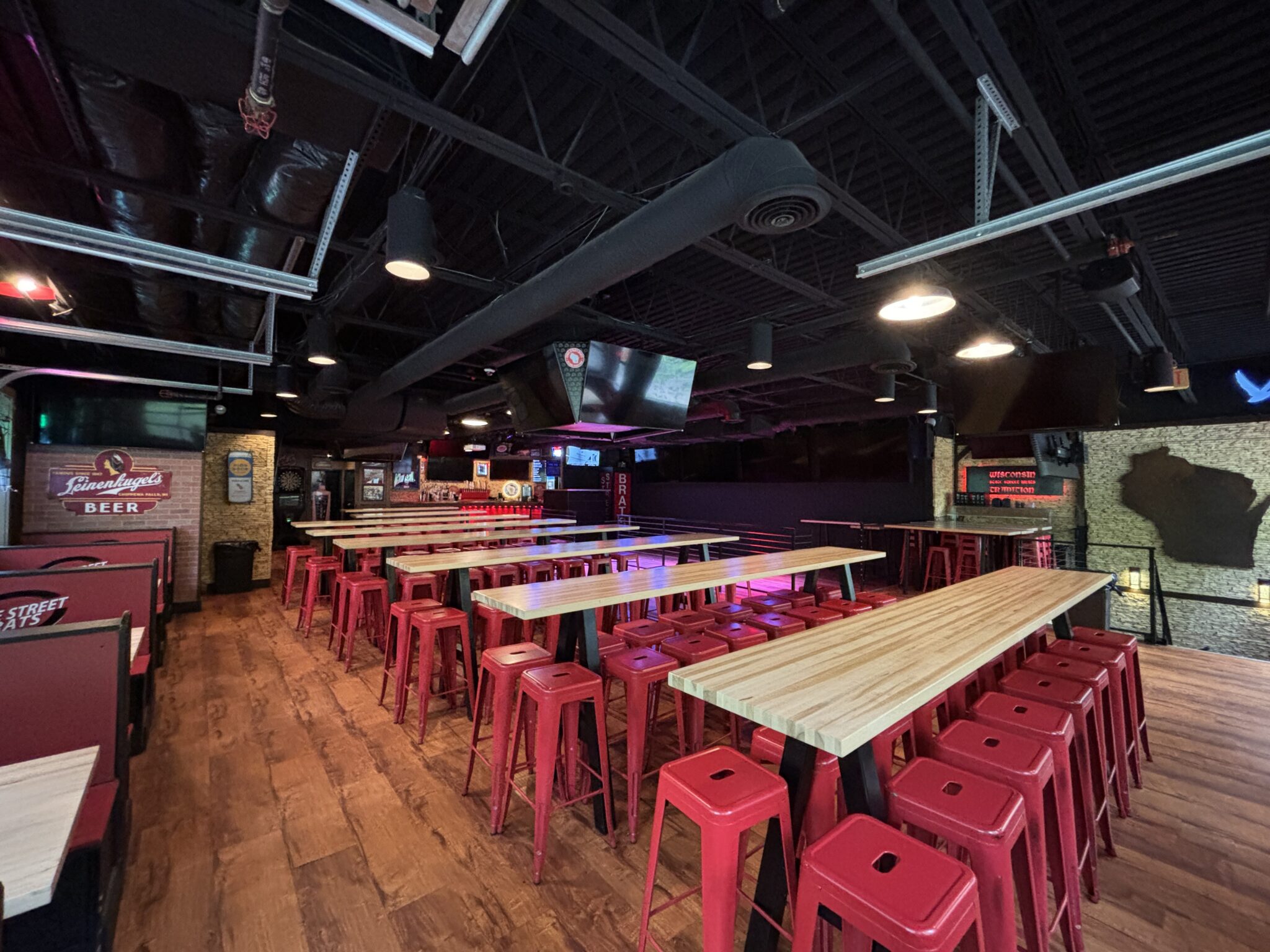 Interior of the upstairs private event space at State Street Brats.