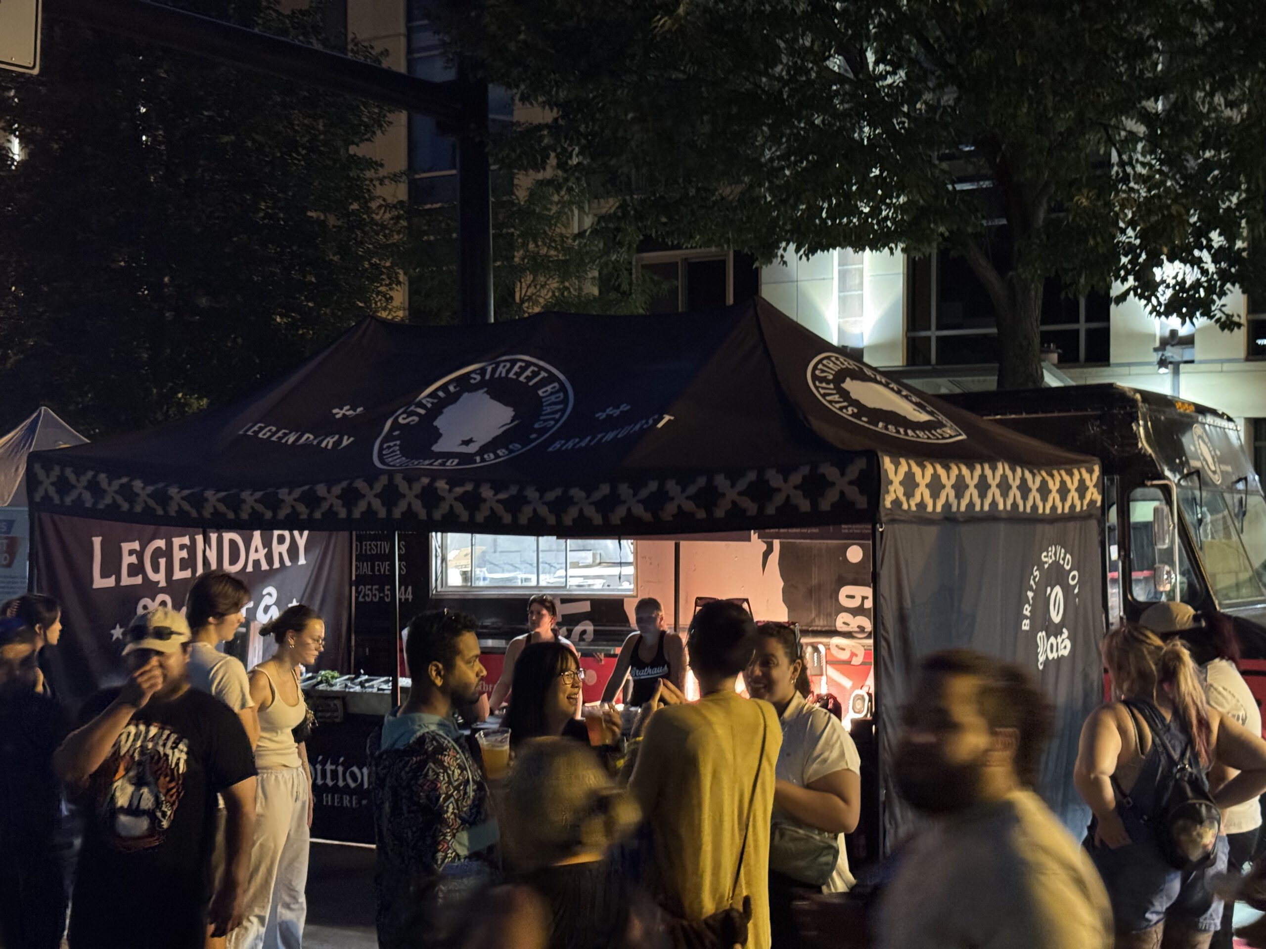 Night time canopy in front of food truck